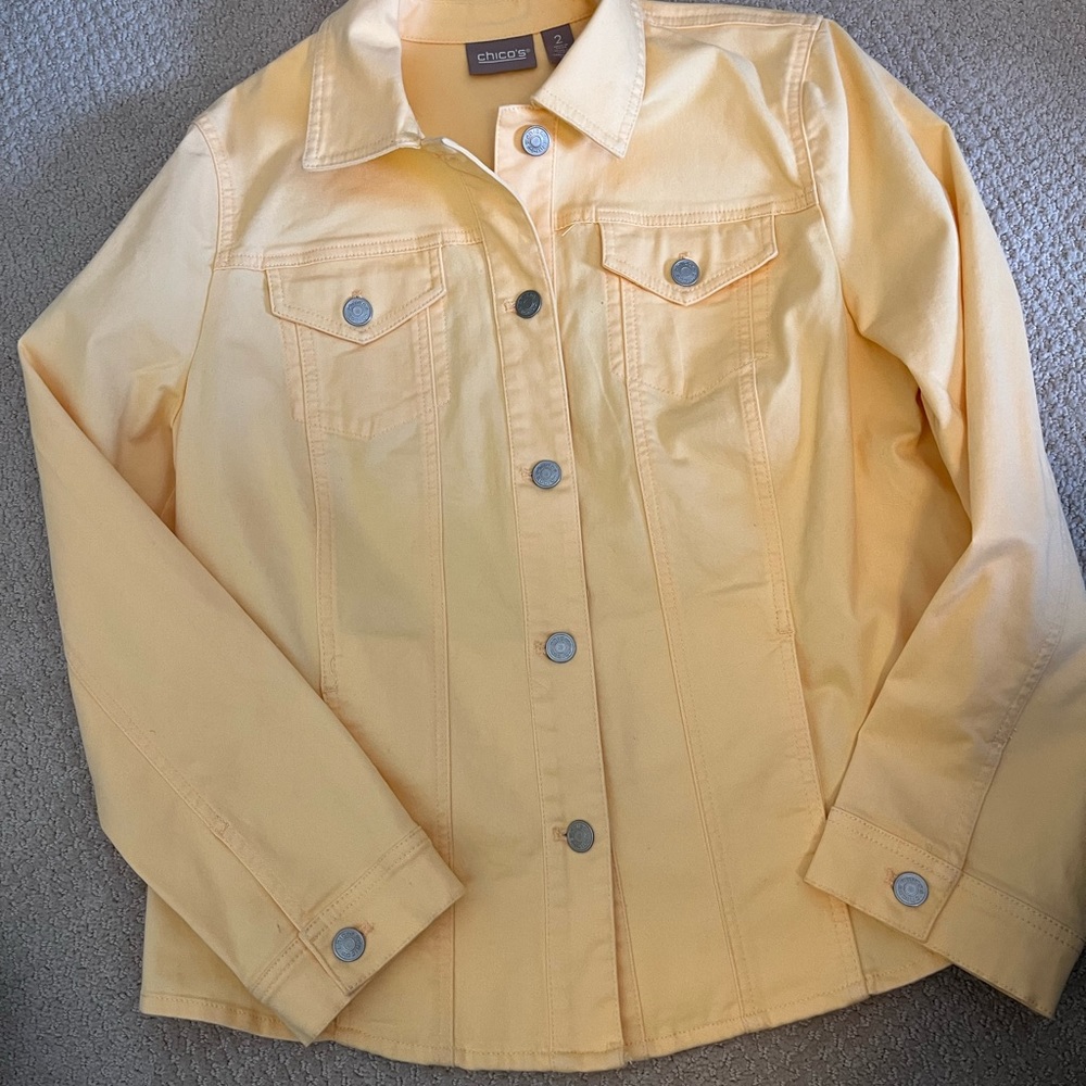 Sunshine  yellow Chico’s denim jacket.
